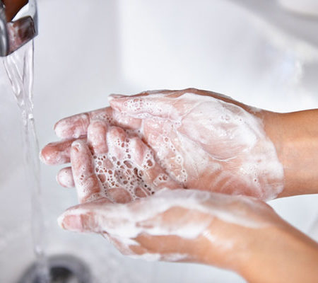 Closeup of person washing their hands