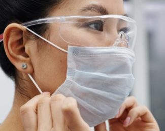 Image of healthcare professional wearing a surgical mask and glasses | Granville Health System