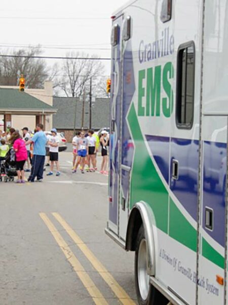 Photo of 4th Annual Granville Ambulance Chase attendees on street